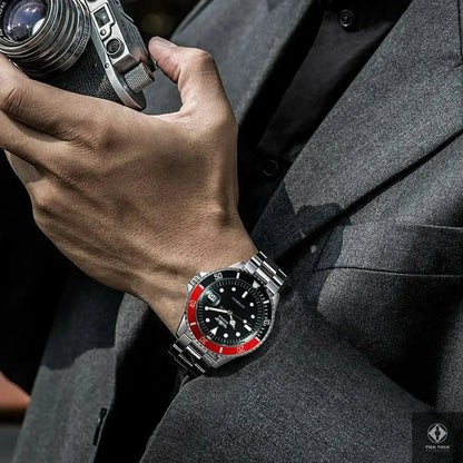 Montre WINNER 320 portée au poignet – look sport chic avec bracelet acier